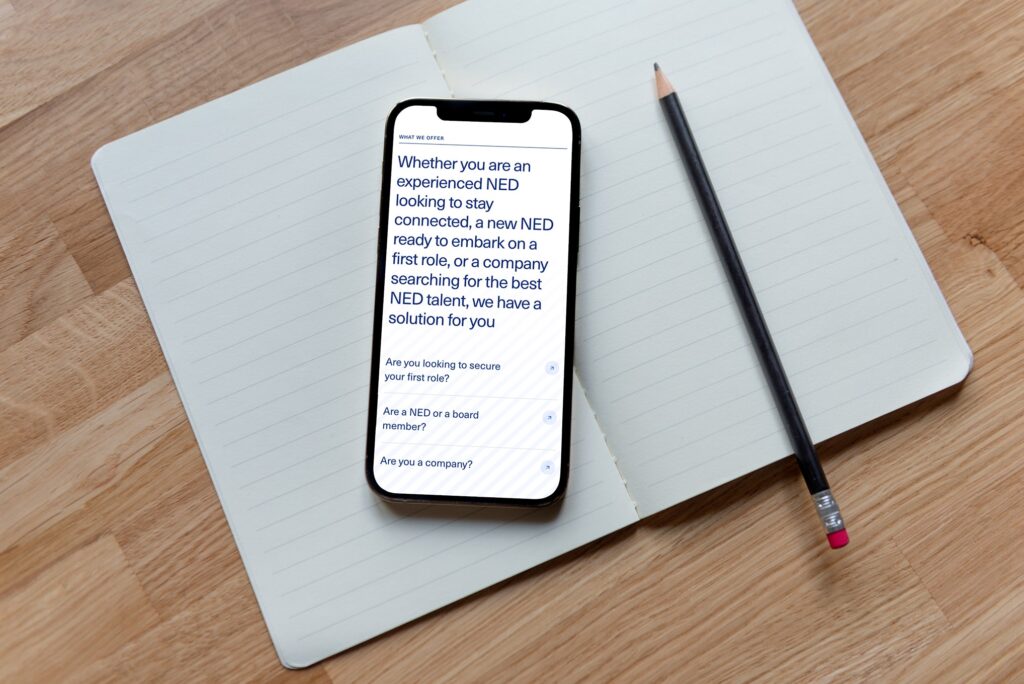 Mockup of an iPhone X displaying a vibrant app interface on a clean, white background.