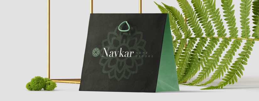 A black bag featuring the word "Navkar" prominently displayed on its surface.